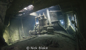 Interior view of Tug Boat wreck, Abu Galawa, Red Sea. by Nick Blake 
